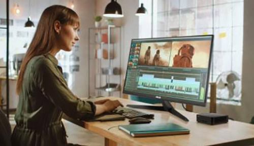 ASUS NUC 14 Pro Yazılımcı ve tasarımcıların video düzenleme yaparken kullandığı bilgisayar ekranı, oyun ve film prodüksiyonu için gelişmiş video düzenleme araçlarıyla dolu, modern çalışma ortamı.